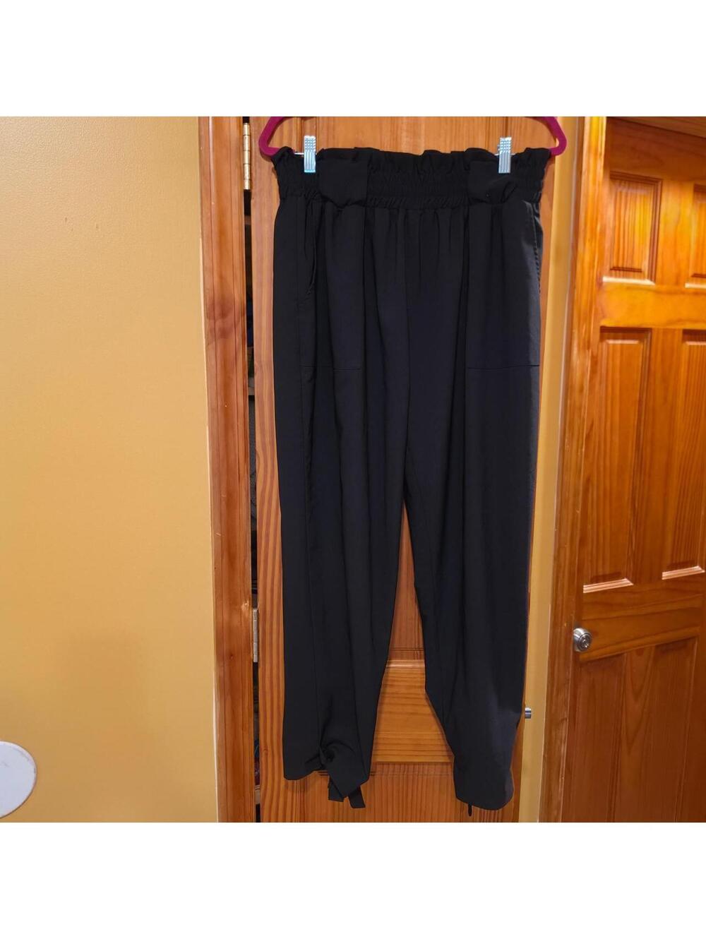 Black paperbag waist pants w/ a wide leg fit Hanna Nicole plus size
